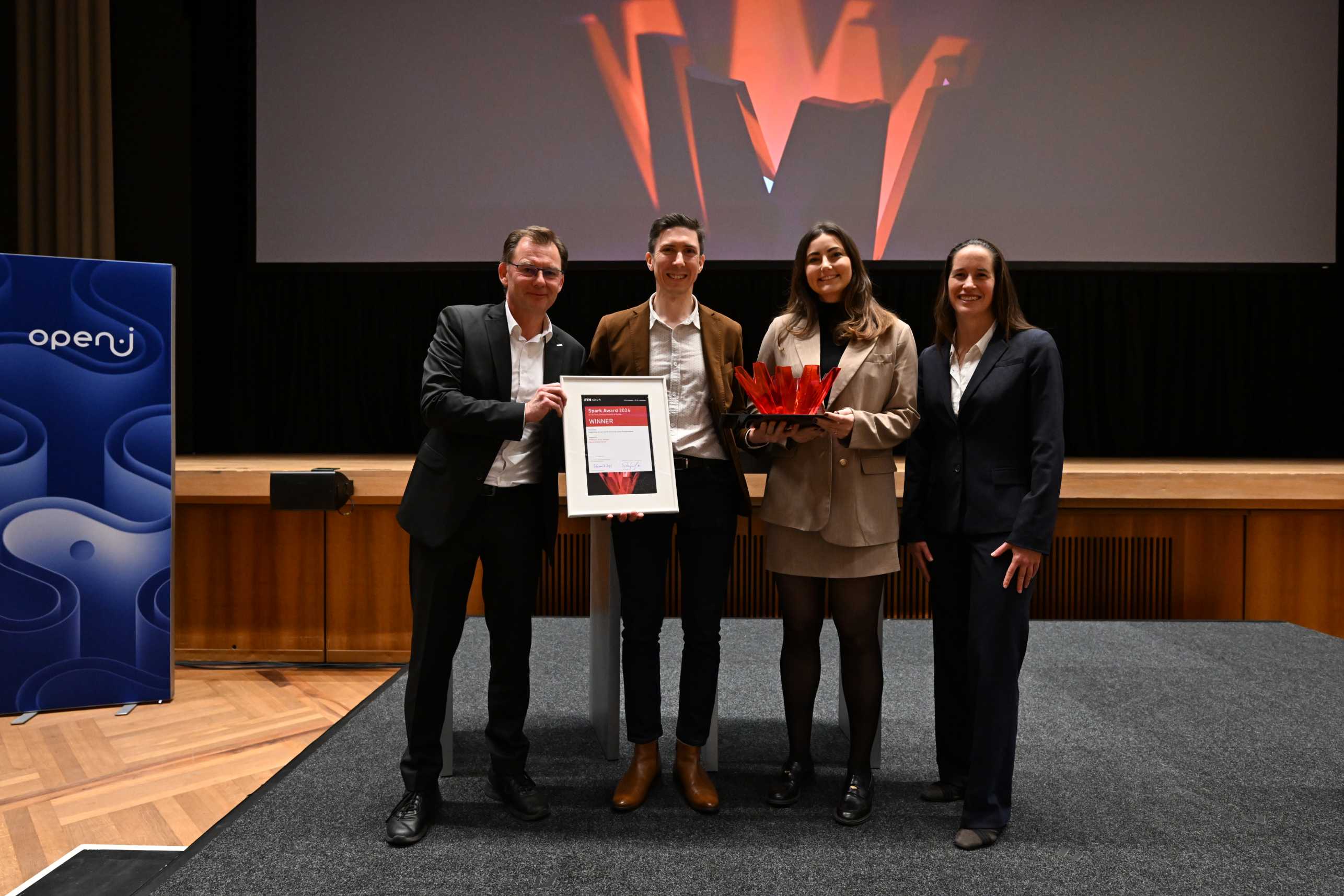 Victor and Marie receiving the award